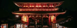 Senso-ji Temple illuminated at night with traditional red lanterns in Asakusa Tokyo