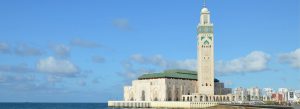 Hassan II Mosque standing by the Atlantic Ocean with its tall minaret in Casablanca