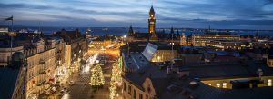 Evening cityscape of Helsingborg with illuminated streets and Helsingborg City Hall overlooking the waterfront