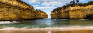 Coastal cliffs and ocean waves at Loch Ard Gorge along the Great Ocean Road in Victoria, Australia