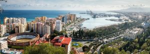 Panoramic view of Málaga skyline with the La Malagueta Bullring and the Mediterranean coastline