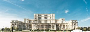 Palace of the Parliament in Bucharest Romania under blue sky, one of the largest administrative buildings in the world