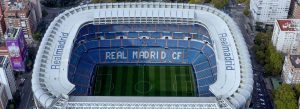 Aerial view of Santiago Bernabéu Stadium, home of Real Madrid CF, showing the pitch and surrounding stands