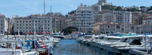 Vieux-Port Marseille harbor with yachts, waterfront buildings, and historic cityscape in southern France
