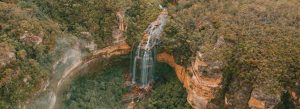 Aerial view of Wentworth Falls cascading over sandstone cliffs in Blue Mountains National Park New South Wales Australia