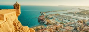 Alicante harbor and marina view from Santa Bárbara Castle overlooking Mediterranean coast in Spain