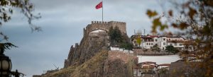 Historic Ankara Castle standing on rocky hills above traditional houses in Ankara, Turkey.