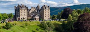 Atholl Palace Hotel and gardens surrounded by scenic Highland landscapes in Pitlochry, Scotland.