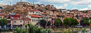 Historic Avanos Village in Cappadocia, Turkey with traditional stone houses and hillside landscape