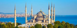 Blue Mosque in Istanbul, Turkey overlooking the Bosphorus with six minarets and clear blue sky