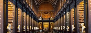 Interior of the Long Room Library at Trinity College Dublin near the Book of Kells exhibition in Ireland.
