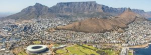 Aerial panoramic view of Cape Town with Table Mountain and coastline in South Africa.