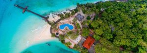 Aerial view of Changuu Island Prison Island with turquoise ocean, beach, and resort in Zanzibar