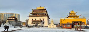 Gandantegchinlen Monastery in Ulaanbaatar, Mongolia with traditional Buddhist architecture and snow-covered grounds