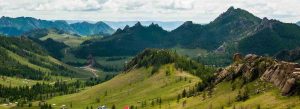 Mountain landscape with green valleys and rocky hills in Gorkhi Terelj National Park, Mongolia