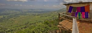 Scenic Great Rift Valley viewpoint in Kenya overlooking green hills and countryside landscapes.