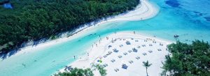 Aerial view of white sandy beaches and turquoise lagoon at Île aux Cerfs