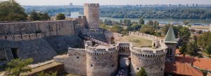 View of Kalemegdan Fortress in Belgrade, Serbia overlooking the Danube River on a sunny day.