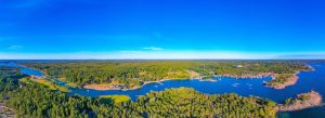 Aerial panoramic view of Käringsund coastline and forests in the Åland Islands, Finland.