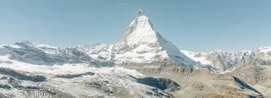 Snow-covered Matterhorn peak towering over Zermatt, Switzerland.