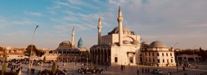 Mevlana Museum and Mausoleum in Konya, Turkey, featuring stunning Ottoman architecture and iconic turquoise dome.