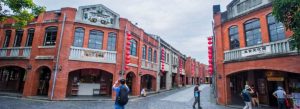 Historic red brick buildings and lantern-lined street at the National Center for Traditional Arts in Taiwan