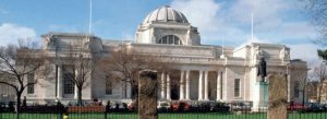 Front view of the National Museum Cardiff featuring neoclassical architecture and grand columns in Wales.