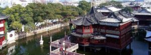 Traditional Chinese pavilion at Yuyuan Garden Shanghai with bridge over pond