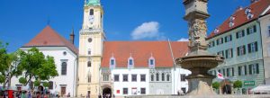 Old Town Hall in Bratislava, Slovakia with historic architecture, town square fountain, and colorful medieval buildings