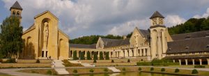 Historic Orval Abbey monastery with landscaped gardens and peaceful surroundings in Belgium