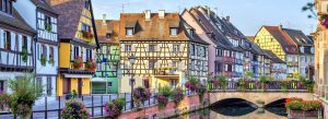 Colorful half-timbered houses lining the canal in Petite Venise district, Colmar, France.