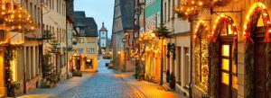 Historic street decorated with Christmas lights in Rothenburg ob der Tauber, Bavaria, Germany