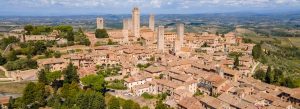 San Gimignano medieval towers and terracotta rooftops in Tuscany countryside Italy