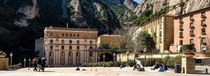 Santa Maria de Montserrat Abbey surrounded by dramatic mountain formations in Catalonia, Spain.