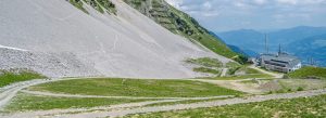 Panoramic view of the Seegrube area in the Nordkette mountain range above Innsbruck, Austria, with alpine trails, rocky slopes, and scenic mountain landscapes.
