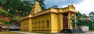 Shri Bhakta Hanuman Temple in Ramboda, Sri Lanka surrounded by lush green hills and traditional Hindu architecture