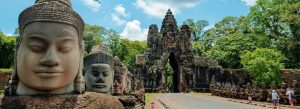 Stone faces at the South Gate of Angkor Thom temple complex in Siem Reap, Cambodia