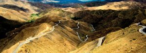 Winding mountain road through the Tizi n'Tichka Pass in the High Atlas Mountains of Morocco.