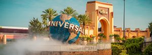 Entrance view of Universal Orlando Resort with the iconic Universal globe fountain in Orlando, Florida.