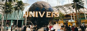 Visitors at Universal Studios globe entrance in Singapore theme park