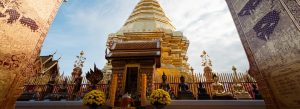 Golden pagoda and Buddhist statues at Wat Phra That Doi Suthep Temple in Chiang Mai, Thailand.