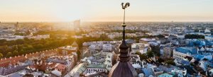 Aerial panoramic view of Riga, Latvia featuring historic Old Town and modern city skyline