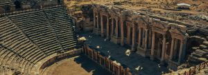Ancient Roman theater ruins at Hierapolis Ancient Theatre with stone seating and columns