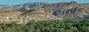 Palm groves and traditional village surrounded by the Atlas Mountains in Tinghir, Morocco